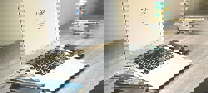 Macbook Air On Grey Wooden Table