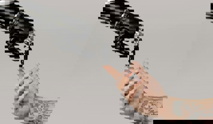 Bionic Hand And Human Hand Finger Pointing