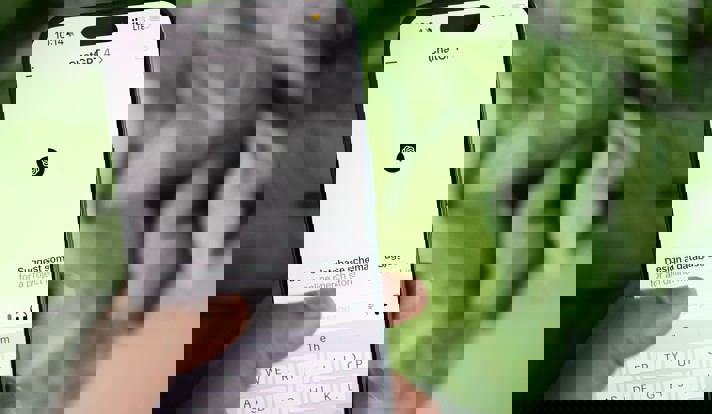 Close Up Of A Person Holding A Smartphone
