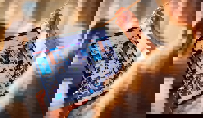 Woman Holding Tablet Computer