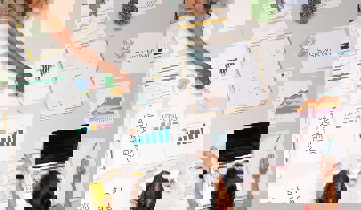 Woman Pointing On The White Paper